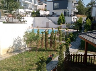 Kuşadası Soğucak bölgesi 4+1 tripleks satılık villa